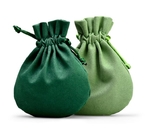 緑の生地のドローストリングのギフトは小さい円形のビロードの宝石類袋を袋に入れる